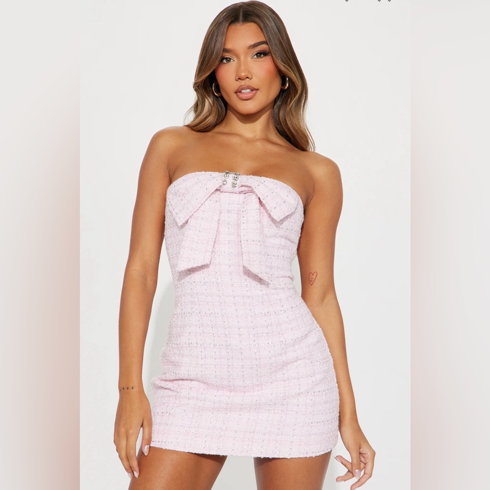 Pink mini dress with bow size large never worn